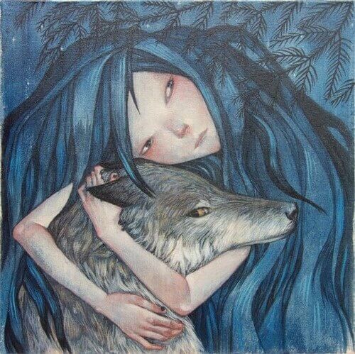 Mujer-abrazando-la-cabeza-de-un-lobo