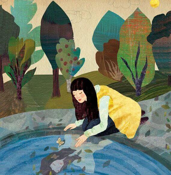 mujer-mirando-su-reflejo-en-el-agua