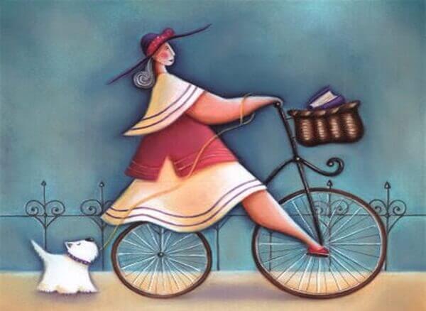 femme sur son velo avec son chien