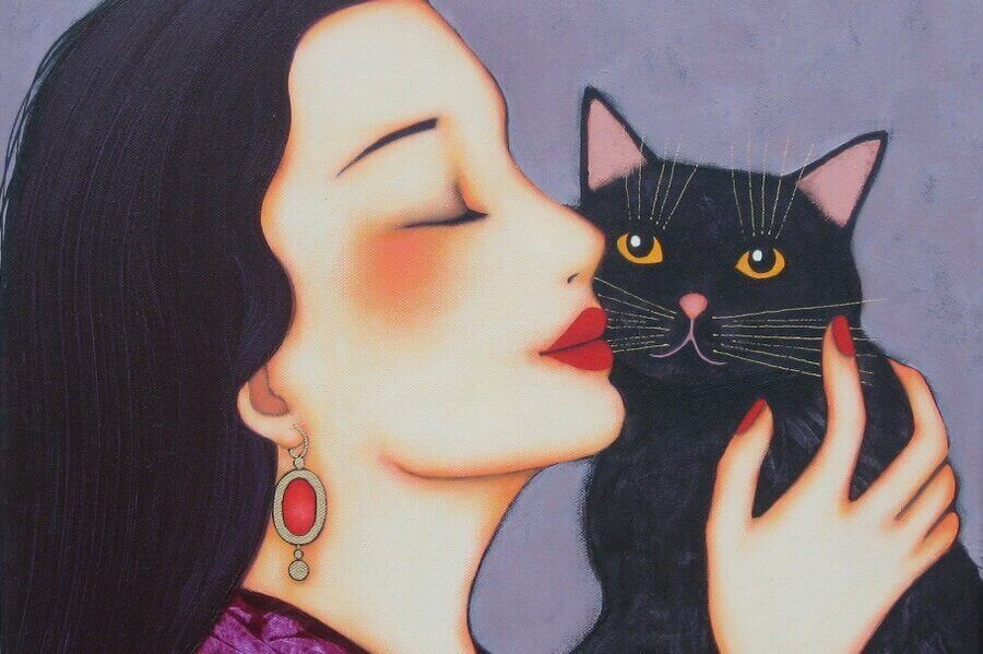 Femme-souriant-calin-chat1