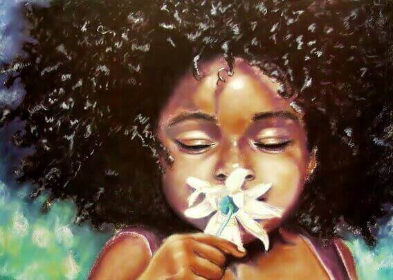 Fille-sentant-une-fleur