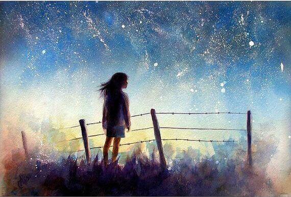 joven-envuelta-en-un-cielo-estrellado