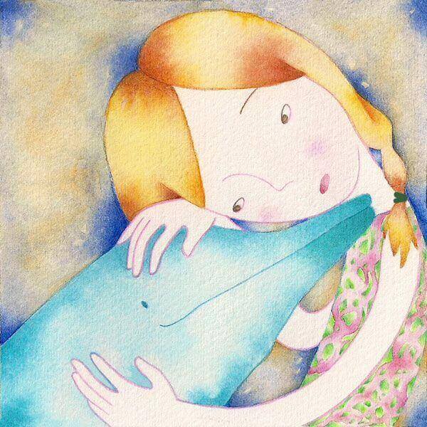 petite fille avec un dauphin