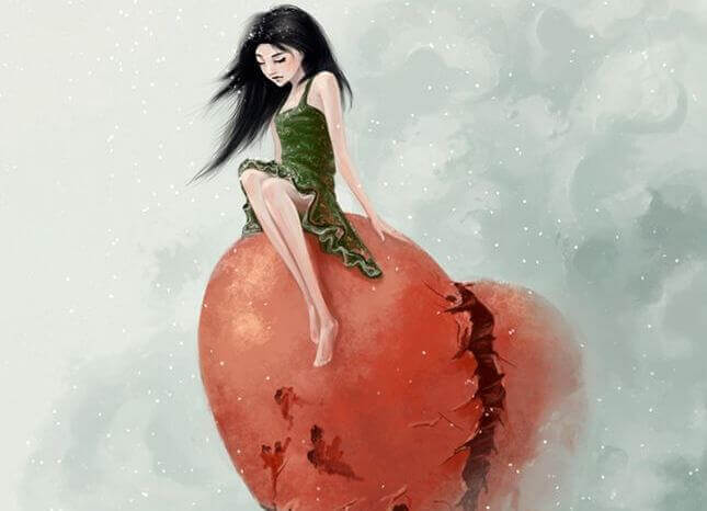 Femme-assise-sur-un-coeur