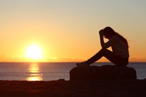 Femme-coucher-du-soleil-souffrance