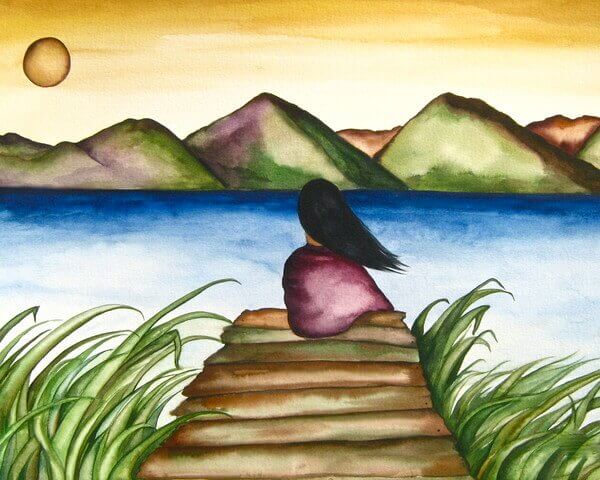 Fille-assise-regardant-le-soleil