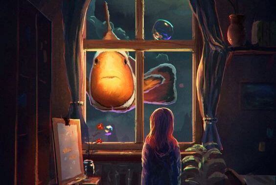 Fille-regardant-une-poisson-methode-Montessori