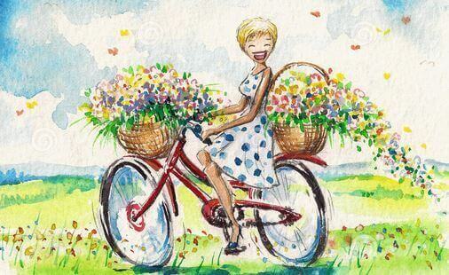 Fille-souriant-en-velo