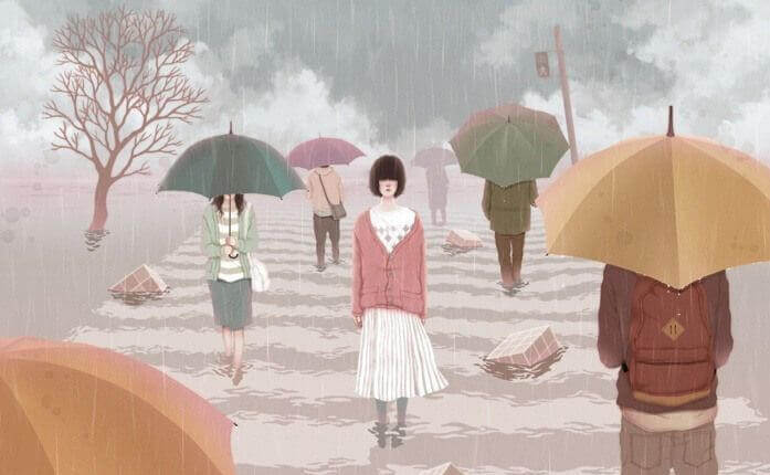 joven-cruzando-un-paso-de-cebra-entre-la-lluvia