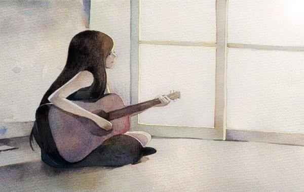 Femme-et-guitare-sur-le-sol