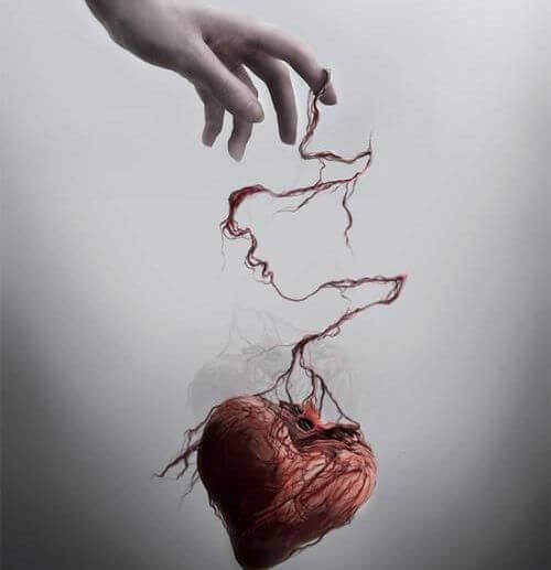 mano-sujetando-corazón-maltratado-1