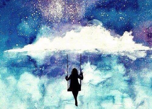 chica-en-un-columpio-en-las-nubes