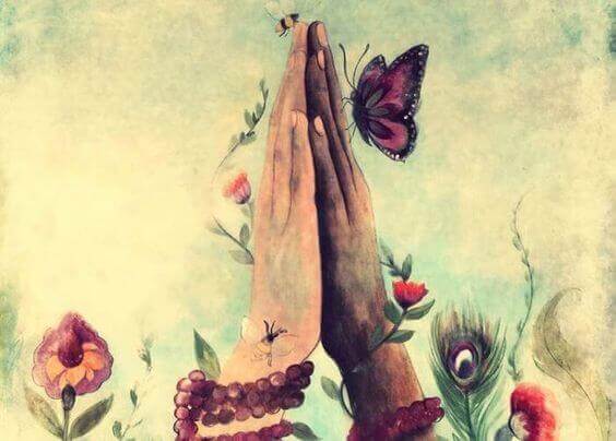 manos-juntas-con-una-mariposa