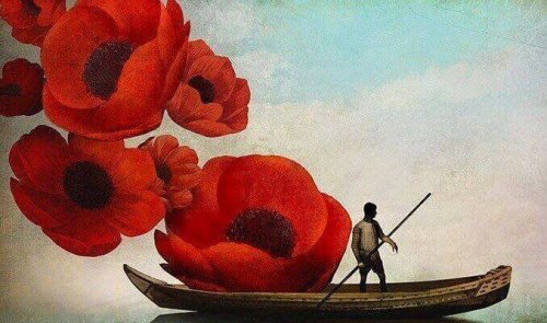 homme sur une barque avec des coquelicots