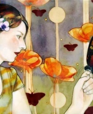 Femme avec papillon dans la main
