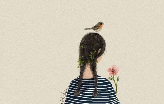 fille avec un oiseau sur la tête