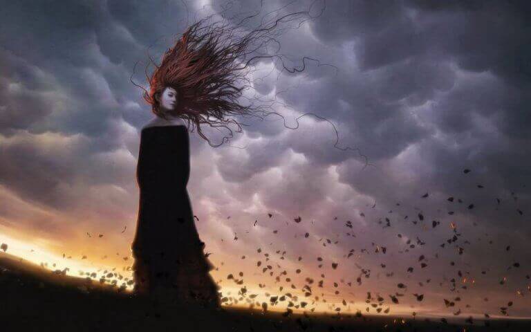 femme triste dans un champ