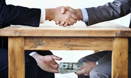 argent sous la table : la corruption