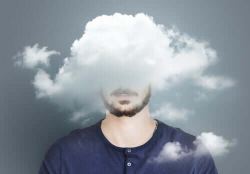 Le désespoir représenté par des nuages sur la tête d'un homme